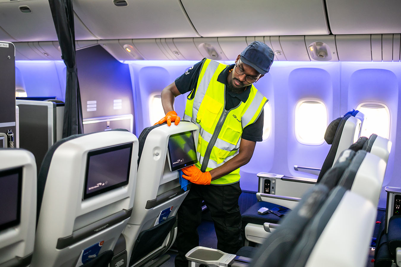 Assured team member preparing an aircraft cabin